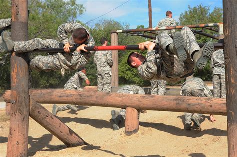 Recruits navigating an obstacle course